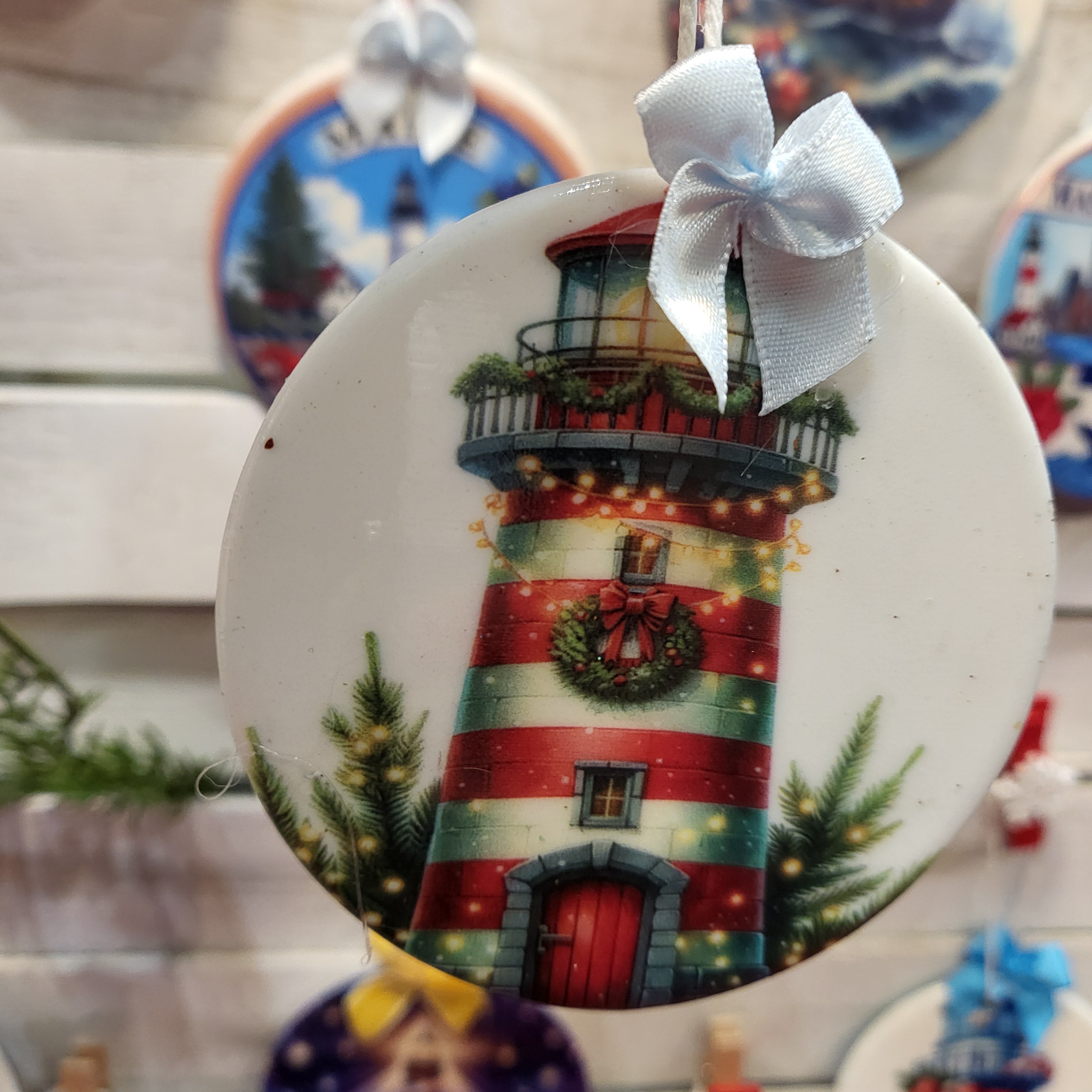 Red and White Striped Lighthouse on Ceramic Art Ornament