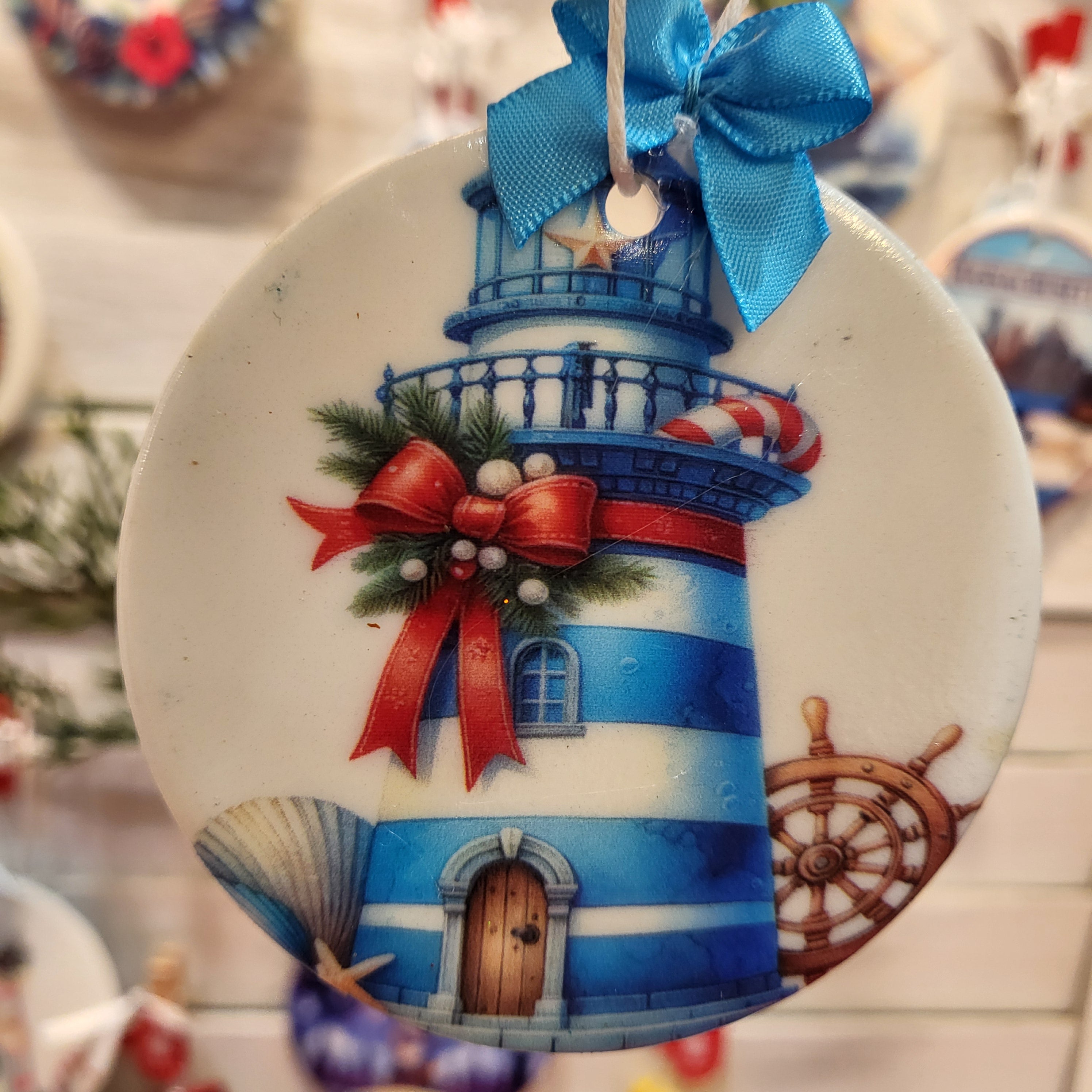 Blue and White Striped Lighthouse on Ceramic Art Ornament